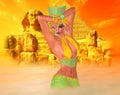 Egyptian woman in desert sandstorm with sphinx and ancient ruins in the background. Royalty Free Stock Photo