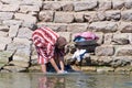 Egyptian woman washing clothes