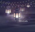 Eid al adha. Greeting card template on Eid Al-Fitr muslim religious holiday with lanterns on blurred lights background