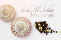 Eid Al Adha sacrifice festival, Islamic Arabic candle and sweet Royalty Free Stock Photo