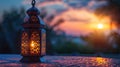 Eid al-Fitr Ornamental Arabic Lantern with Glowing Candle During Muslim Holy Month of Ramadan Kareem Evening