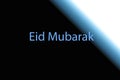 Eid or Idd mubarak written on blue & black background with moon and star shape. Royalty Free Stock Photo