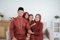 Eid Mubarak concept,asian family wearing Malay traditional clothes Royalty Free Stock Photo