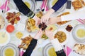 Muslim family having Iftar dinner eating dates to break feast top view Royalty Free Stock Photo