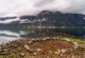 Eidfjord, a Norwegian town and municipality in the Hordaland region, view from the beach on the Eid fjord, the inner branch of the