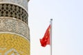 Eidgah mosque minaret with Chinese flag