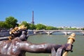 Eiffel Tower, artistic statue and bridge on Seine river in Paris, France. Royalty Free Stock Photo