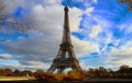 Eiffel Tower with autumn leaves in Paris, France Royalty Free Stock Photo