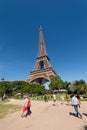 Eiffel Tower from the Champ de Mars gardens in summer. Royalty Free Stock Photo