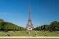 Eiffel Tower from the Champ de Mars gardens in summer. Royalty Free Stock Photo