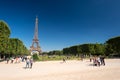 Eiffel Tower from the Champ de Mars gardens in summer. Royalty Free Stock Photo