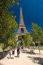 Eiffel Tower from the Champ de Mars gardens in summer. Royalty Free Stock Photo