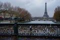 The Eiffel Tower Covered in Padlocks, A Symbolic Reflection of Love and Connection, A love lock bridge over the river Seine with