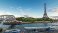 Eiffel tower with Debilly Footbridge and Jena bridge over Seine river day to night timelapse, Paris, France Royalty Free Stock Photo
