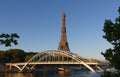 The Eiffel tower with Debilly Footbridge over Seine river Paris, France.