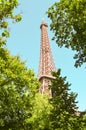 Eiffel Tower framed by trees