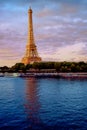 Eiffel Tower with dramatic evening light and silky Seine River