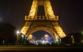 Eiffel tower with golden illumination by night in Paris Royalty Free Stock Photo