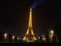 Eiffel tower with golden illumination by night in Paris Royalty Free Stock Photo