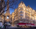 Eiffel tower between haussman buildings in Paris Royalty Free Stock Photo