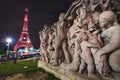 Eiffel Tower with historic statue Royalty Free Stock Photo