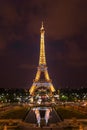 Eiffel Tower illumination show at night. Paris, France