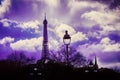 Eiffel Tower and lantern on the evening sky background. Beautiful dramatic sky. Purple toned Royalty Free Stock Photo