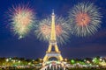 Eiffel tower light performance show and New Year 2017 fireworks in night. Royalty Free Stock Photo