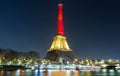 The Eiffel tower lit up with the colors of Belgian National flag Royalty Free Stock Photo