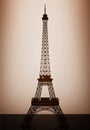 Eiffel Tower Model with backlight over Wall. 3d Rendering