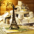 Eiffel tower, model kit, on traditional french cheeses Royalty Free Stock Photo