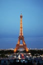 Eiffel Tower in night. Famous historical landmark on the quay of a river Seine. Romantic, tourist, architecture symbol