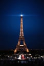 Eiffel Tower in night. Famous historical landmark on the quay of a river Seine. Romantic, tourist, architecture symbol