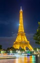 Eiffel tower at night illumination in Paris, France Royalty Free Stock Photo