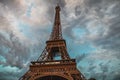 Eiffel Tower In Paris Against Dramatic Twilight Sky At Evening Summer Time.