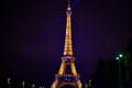 Eiffel tower in Paris during its lightshow at night