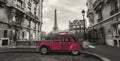 Eiffel Tower in Paris and retro red car at the  Avenue de Camoens Royalty Free Stock Photo