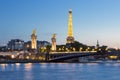 Eiffel Tower and Pont Alexandre III by night Royalty Free Stock Photo