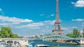 Eiffel tower at the river Seine timelapse from bridge in Paris, France Royalty Free Stock Photo