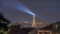 Eiffel Tower and Sacred Heart Basilica at Night in Paris Viewed from Above Rooftops Royalty Free Stock Photo