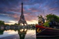 Eiffel Tower by the Seine River in Paris at sunrise. France Royalty Free Stock Photo