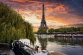 Eiffel Tower by the Seine River in Paris at sunrise. France Royalty Free Stock Photo