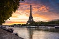 Eiffel Tower by the Seine River in Paris at sunrise. France Royalty Free Stock Photo