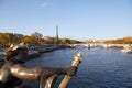 Eiffel tower and Seine river seen in a sunny autumn day from Alexander III bridge in Paris Royalty Free Stock Photo