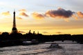 Eiffel Tower Silhouette And The River Seine At A Parisian Sunset