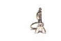 Eiffel tower souvenir keychain isolated on white.