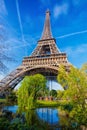 Eiffel Tower with spring trees in Paris, France Royalty Free Stock Photo