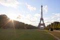 Eiffel tower and the sun with its rays in Paris Royalty Free Stock Photo