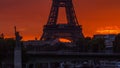 Eiffel Tower sunrise timelapse with boats on Seine river and in Paris, France. Royalty Free Stock Photo