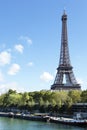 Eiffel Tower vertical landscape, river seine and boats Royalty Free Stock Photo